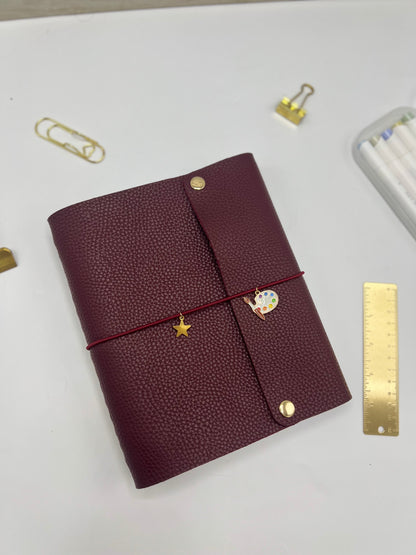 Plum Leather Teacher Planner (Arabic)
